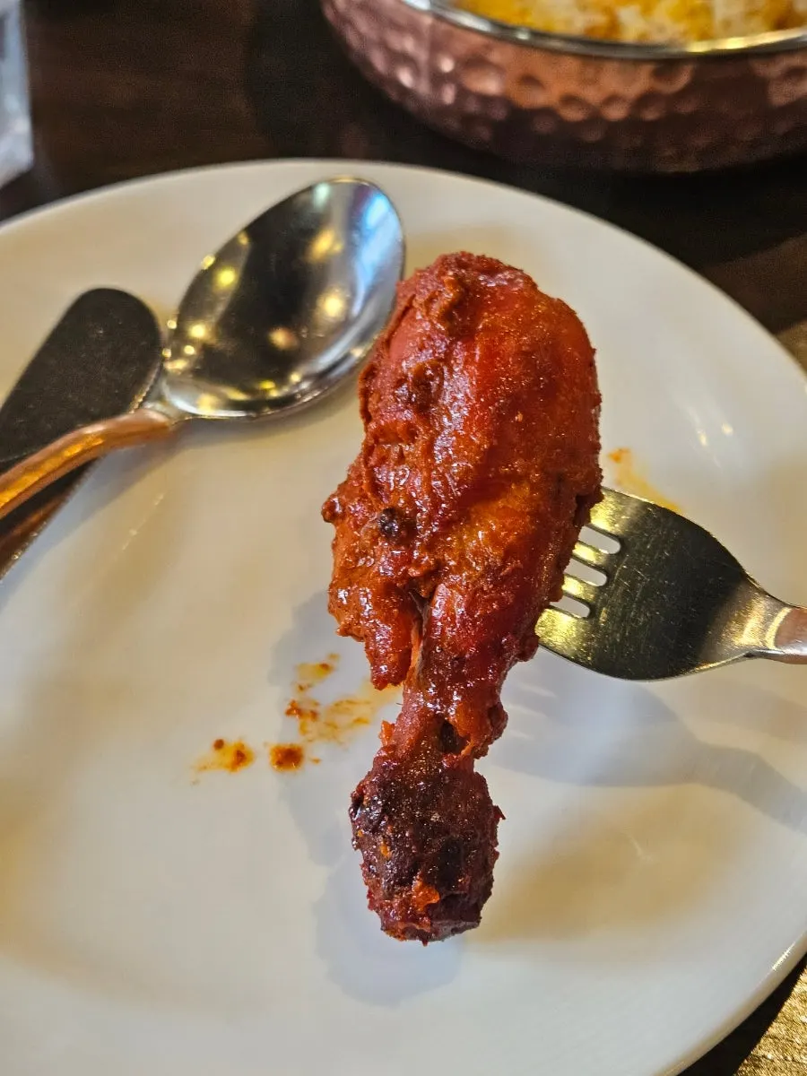 Whole tandoori chicken fresh from the clay oven
