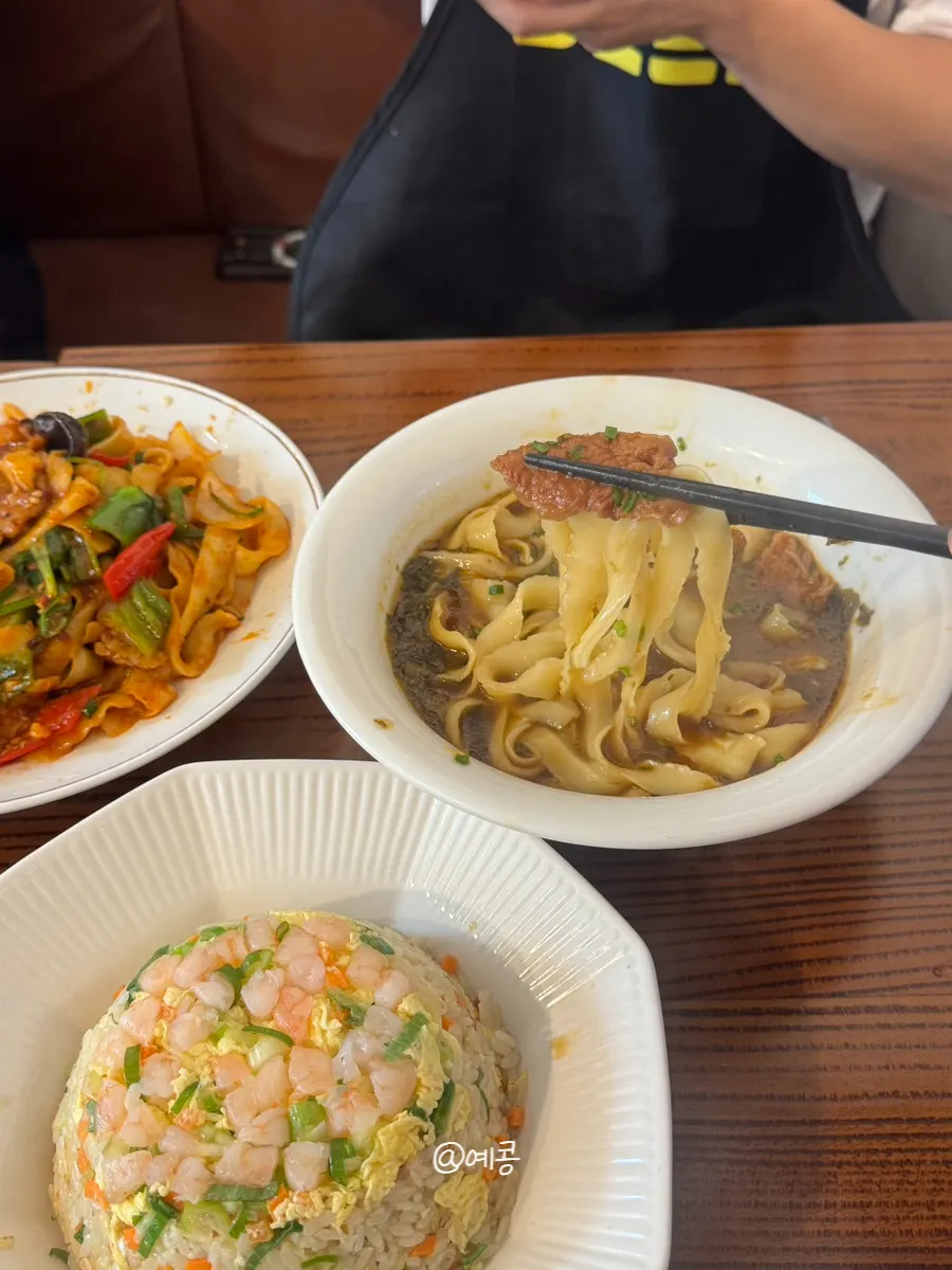 A bowl of beef knife-cut noodles with thick noodle strands