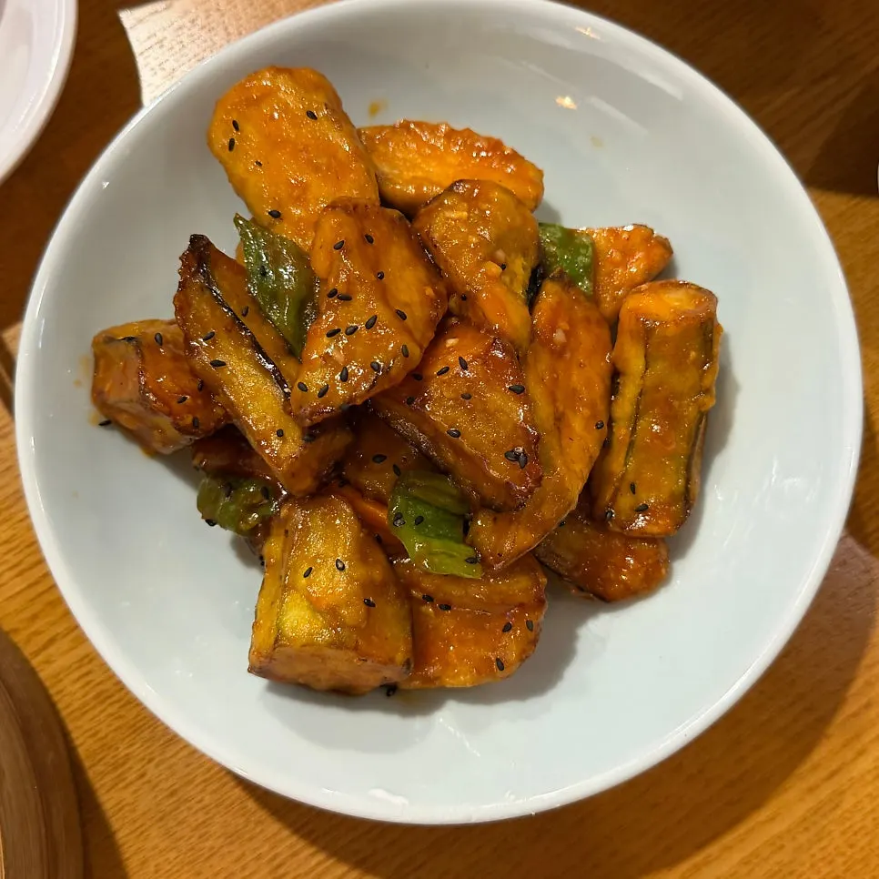 Fried eggplant at Cheonghwawon sprinkled with black sesame seeds