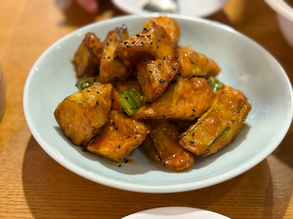 A plate of thick-cut fried eggplant