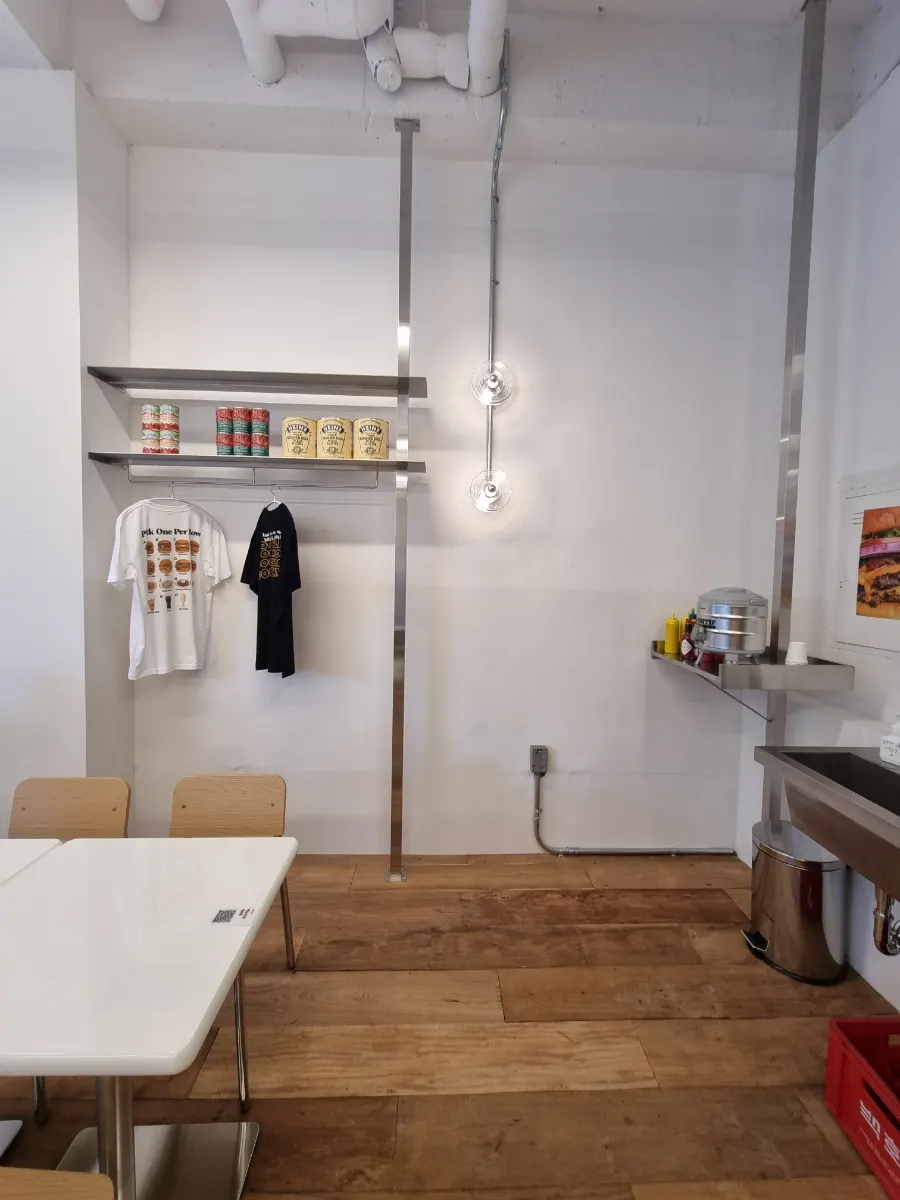 Open kitchen at Burgiz Daeheung with lettering above it