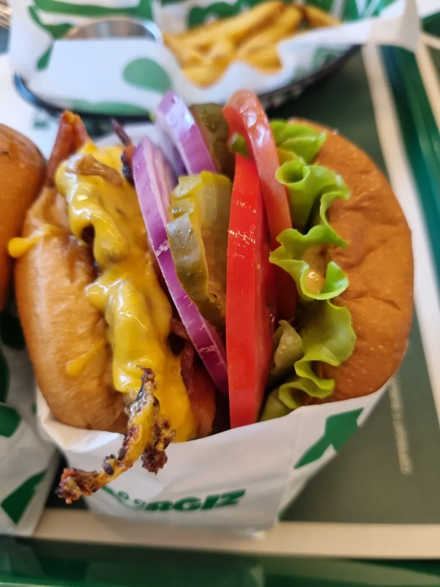 Godfather burger piled high with toppings