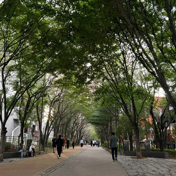 Outdoor seating area at Gongjung Dodeok by Gyeongui Line Forest Park