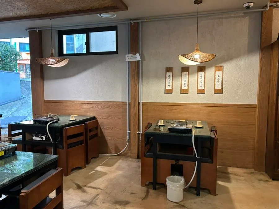 Korean dining space at Gongjung Dodeok by Gyeongui Line Forest Park