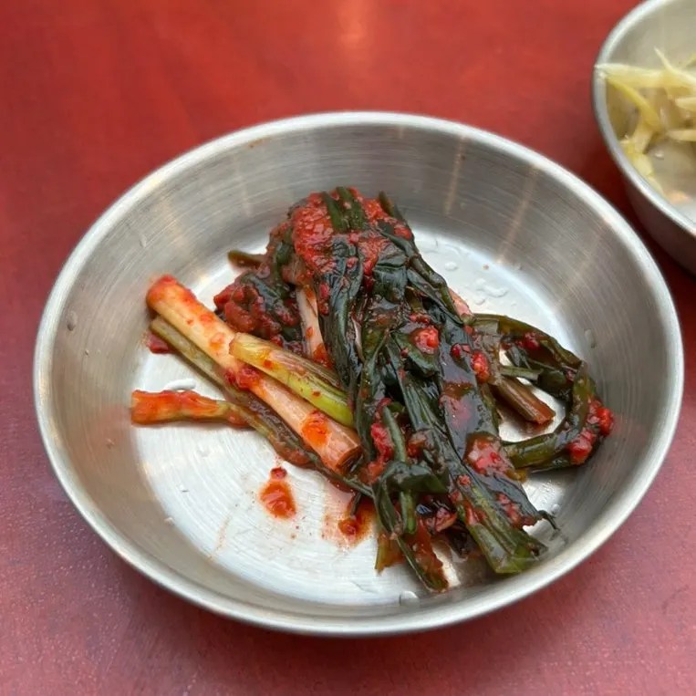 Table spread of ordered dishes at Gongjung Dodeok