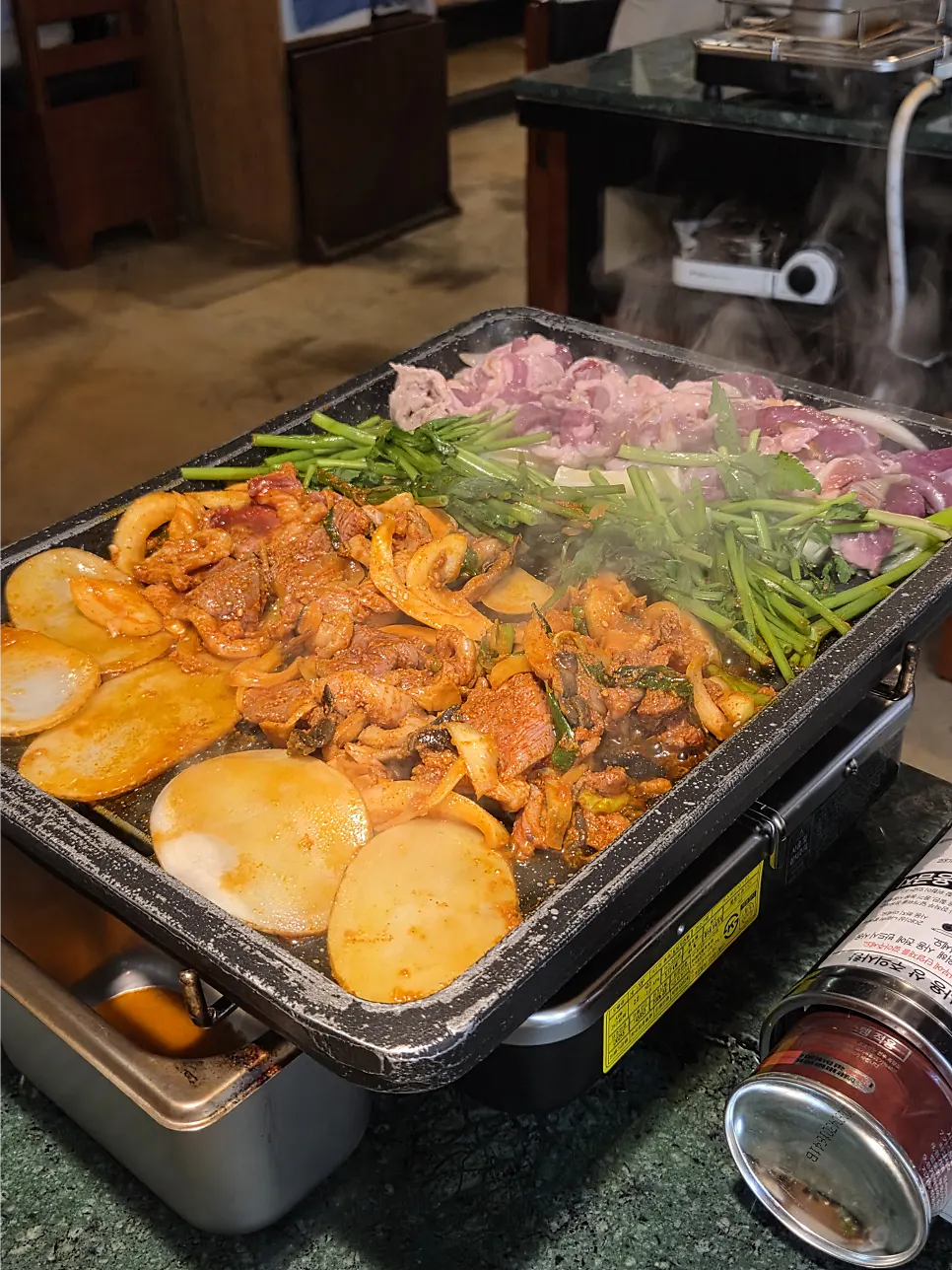 Half-and-half grilled duck served with minari