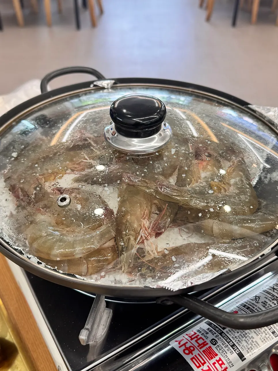 A plate of large raw shrimp