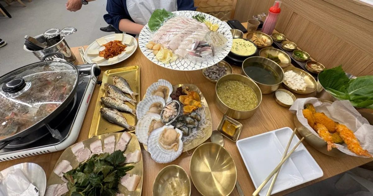 A table with enough food for a group
