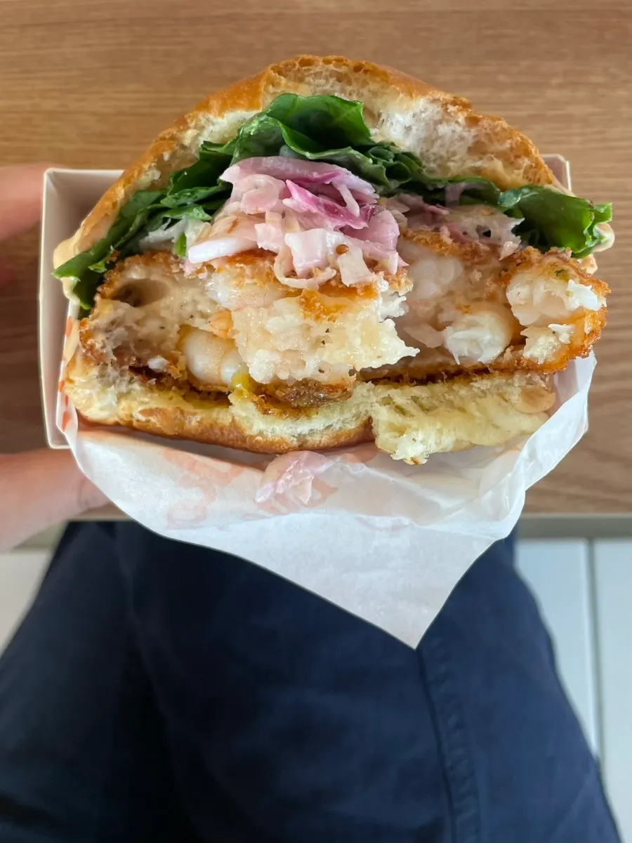 Close-up of whole-shrimp burger