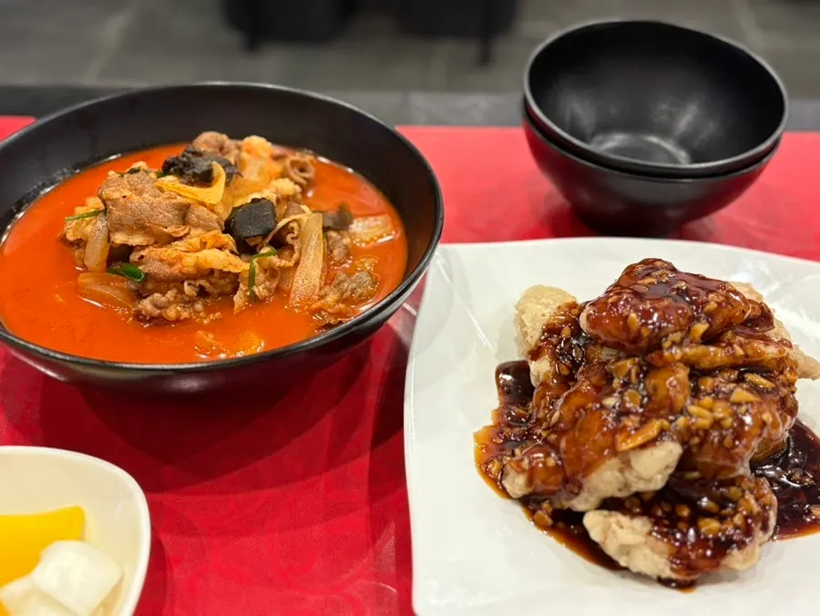 Table spread of meat jjamppong and garlic tenderloin tangsuyuk