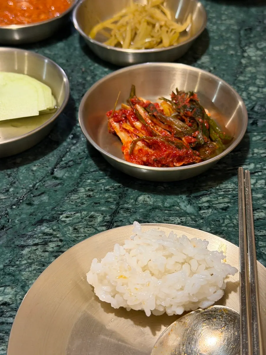 Table set with small plates and banchan