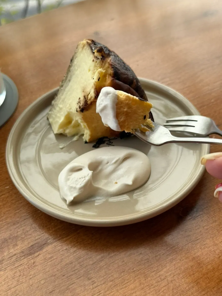 The moist interior of a thick slice of Basque cheesecake