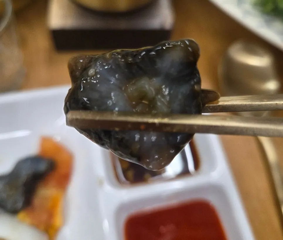 Assorted seafood with scallops, sea squirts, sea cucumber, and abalone