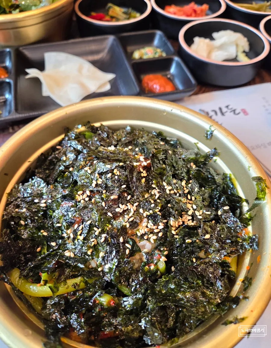 Snow crab jjigae and bowl bibimbap side dishes