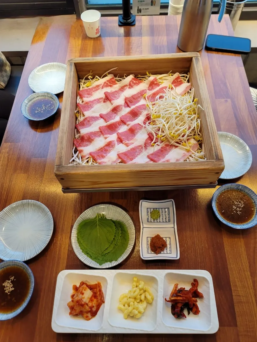 Bean sprouts and beef in the cypress steaming basket