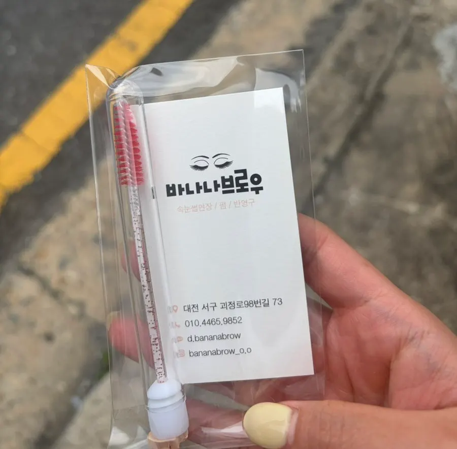 Lash comb and aftercare instruction sheet