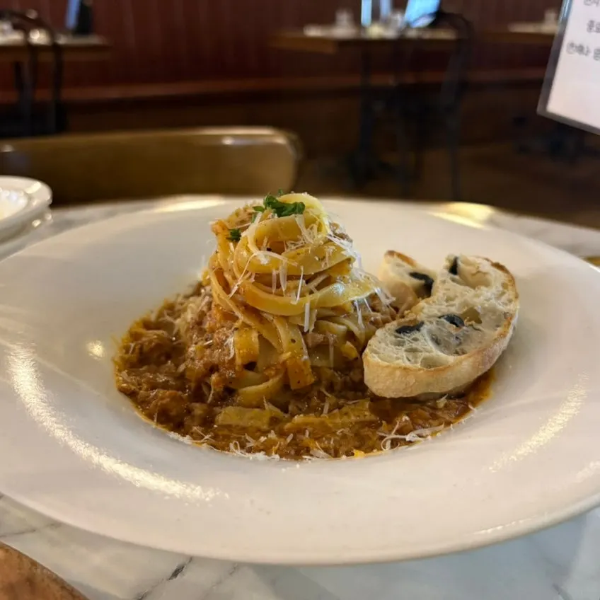 A plate of bolognese ragu pasta at Bologna