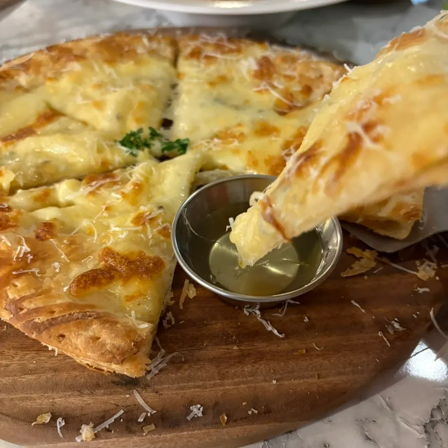 Cross-section of the pastry-dough gorgonzola pizza