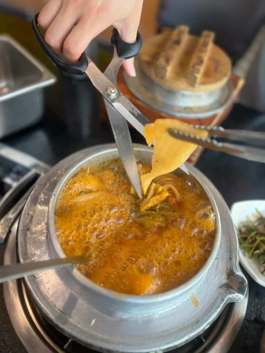 Close-up of the galbi kimchi stew simmering