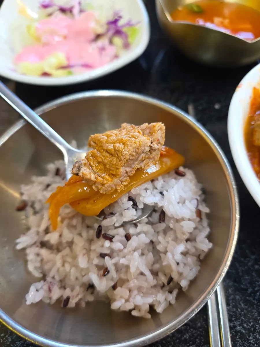 Galbi kimchi jjigae filled with generous pieces of meat