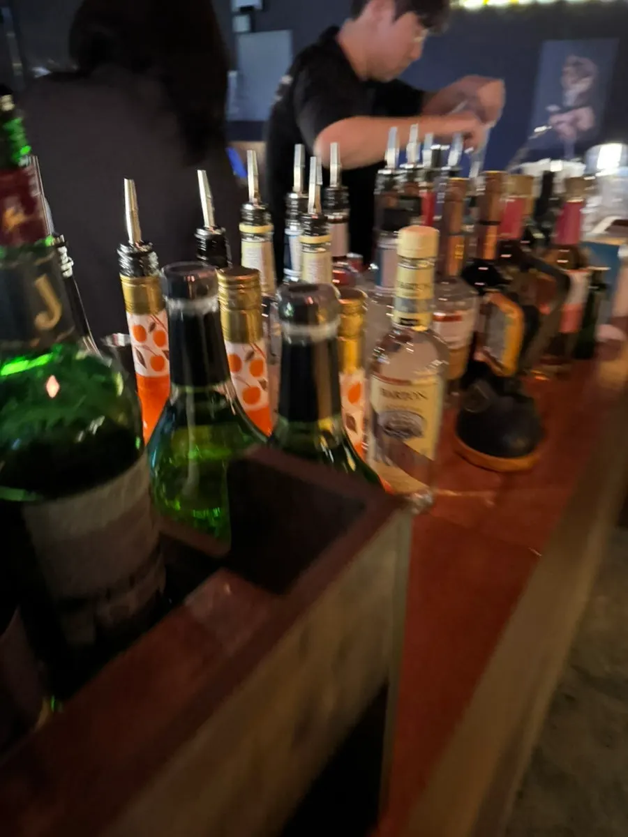 Whisky display shelf on the bar wall
