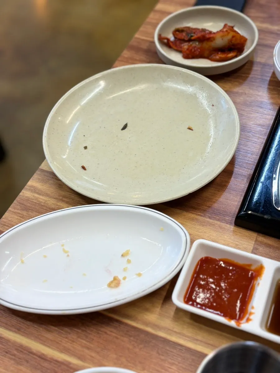A plate of kimchi pancake loaded with filling