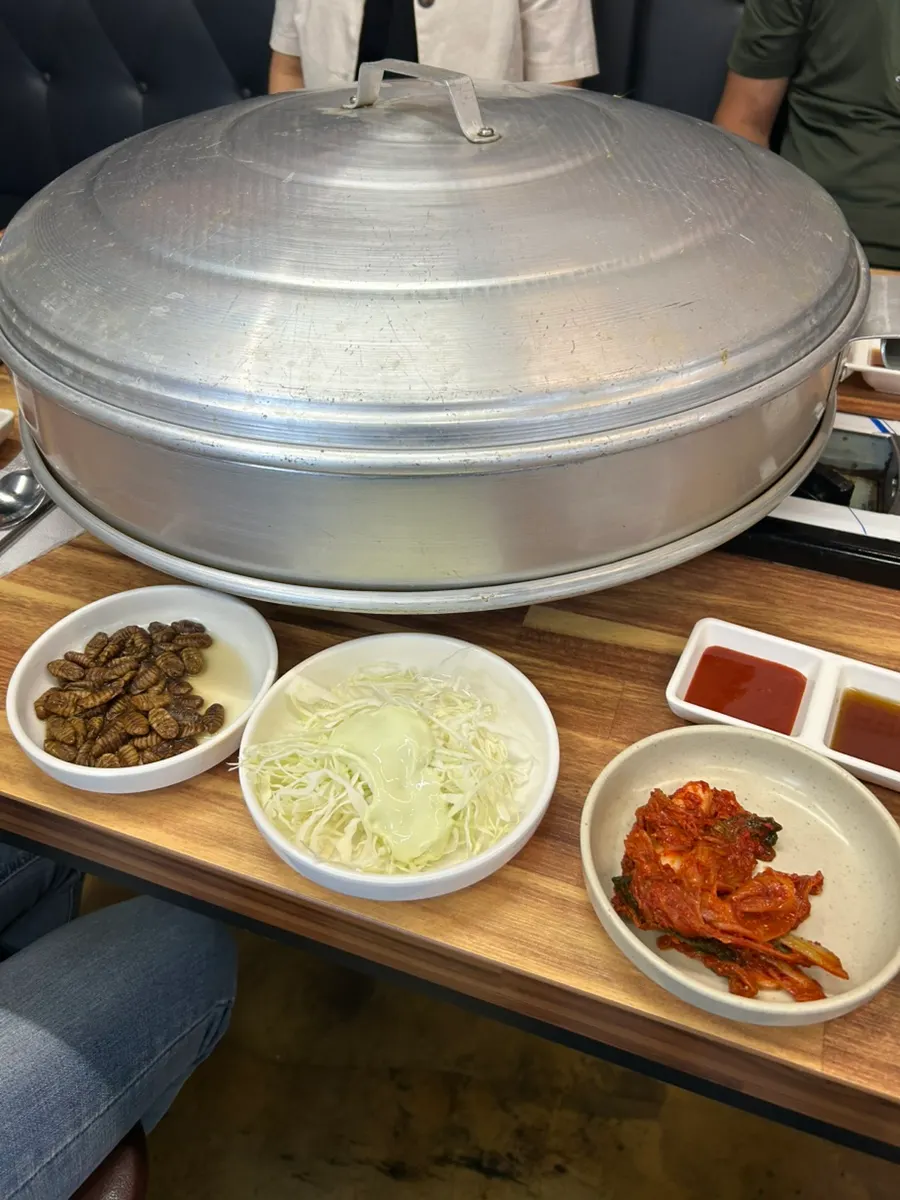 Table being prepared for the clam hot pot spread