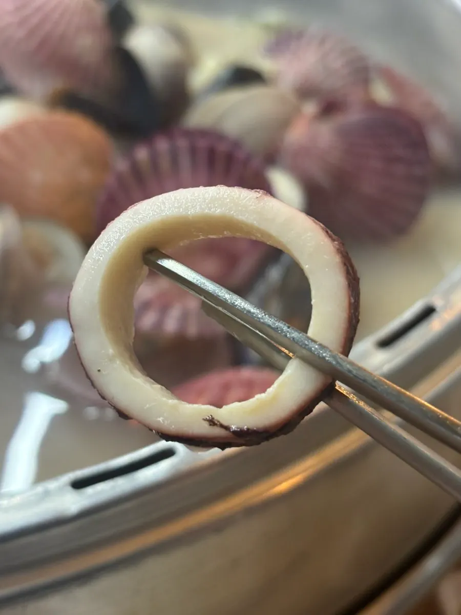 Abalone and clams being trimmed