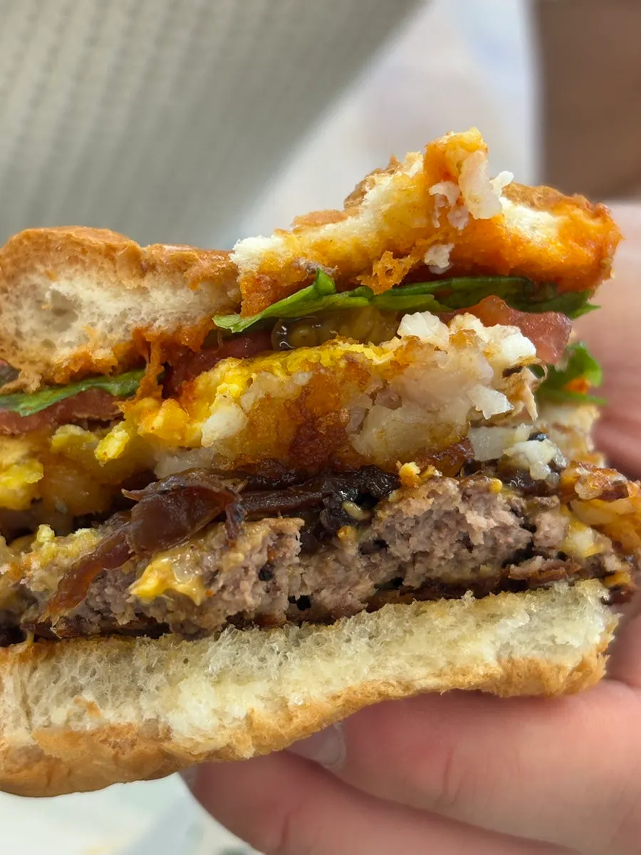Cheese inside a cross-section of the mushroom burger