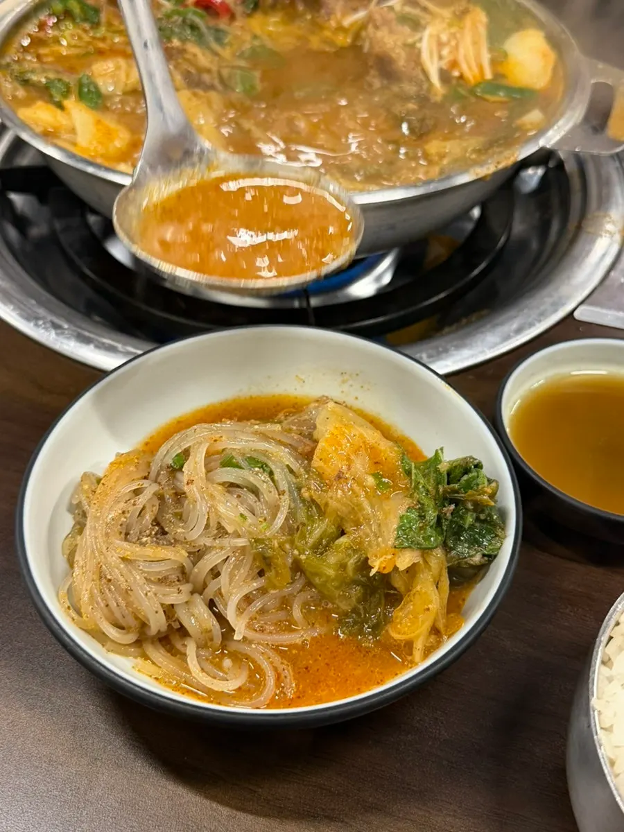Sujebi and glass noodles in the thickened broth