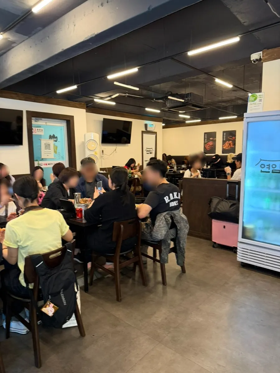 Nearly full interior of the gamjatang restaurant