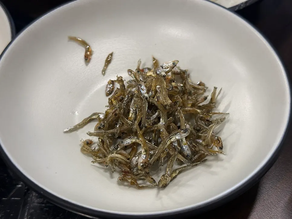 Stir-fried anchovies and pickled onions among the side dishes