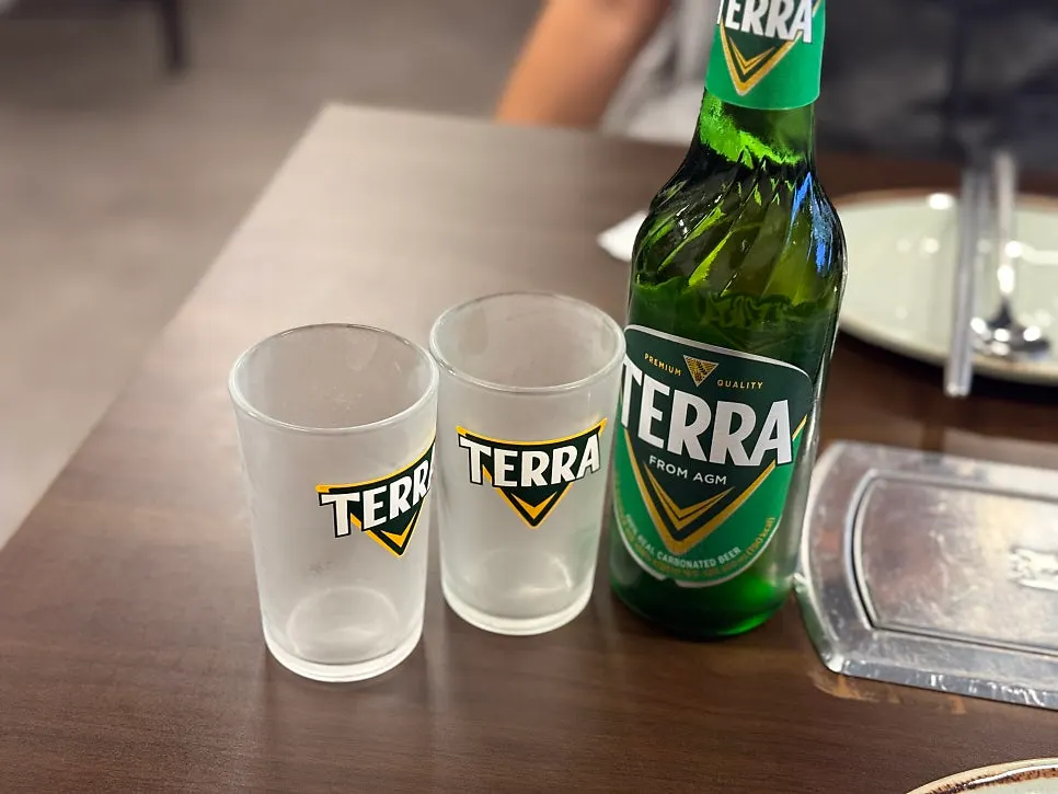 Cold beer paired with the pork bone grill