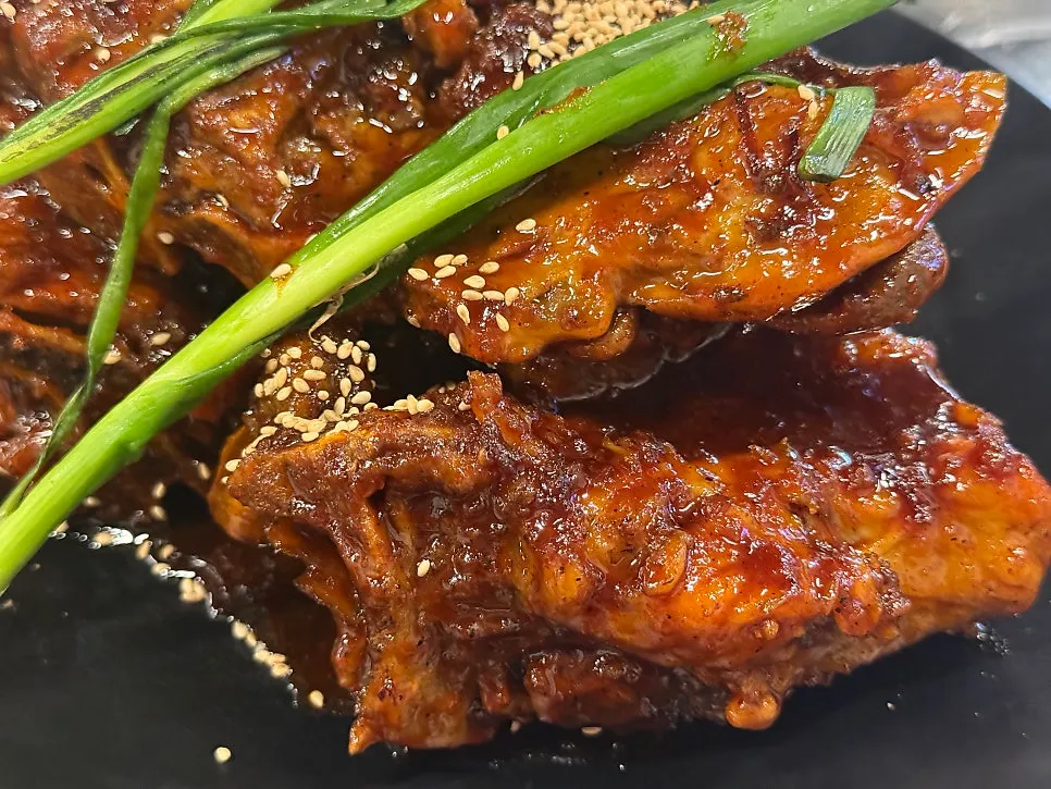 Tender meat pulled away from the bone