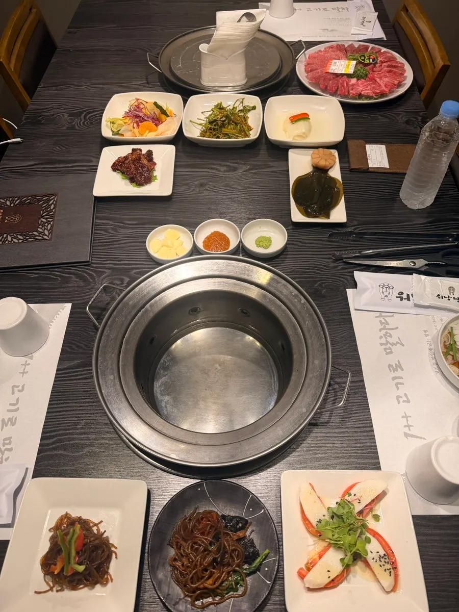 A piece of grilled hanwoo eaten with just salt
