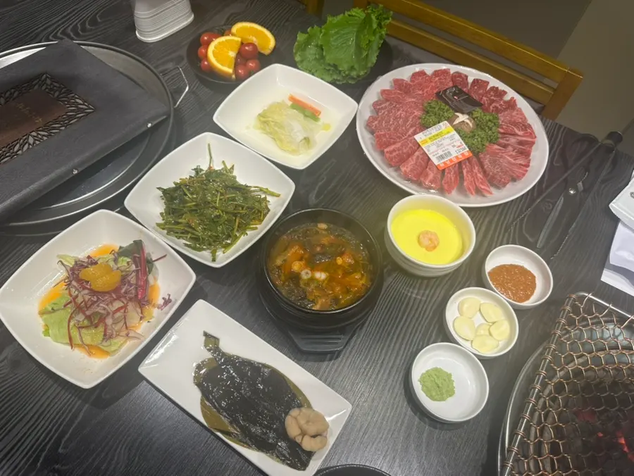 Basic spread with beef tartare, tripe, and seasoned crab