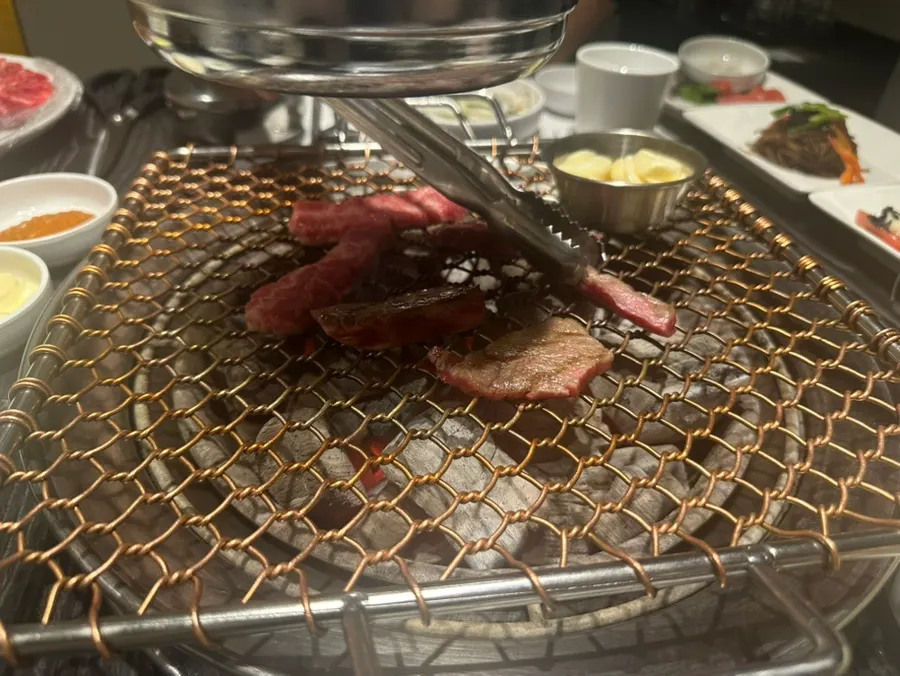 Hanwoo and mushrooms on the charcoal grill