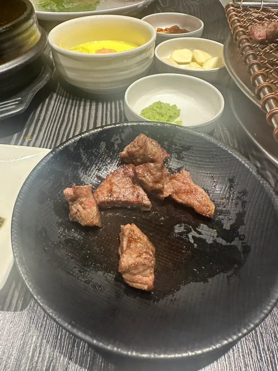 Grilled hanwoo cut into bite-sized pieces