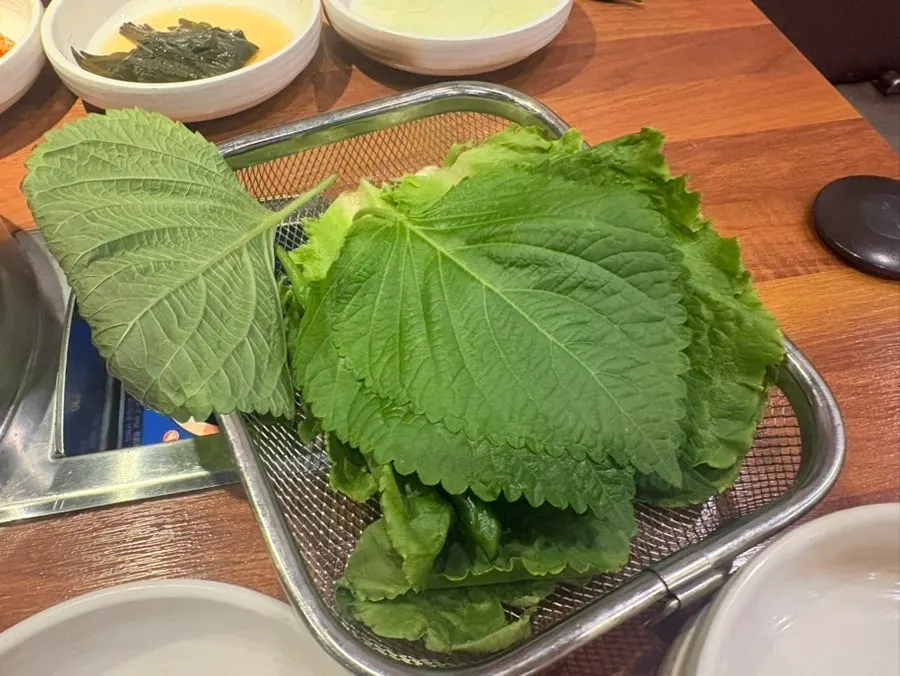 Self-serve bar with lettuce wraps and vegetables