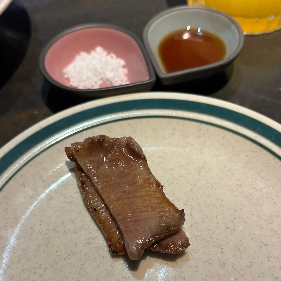The owner grilling Korean beef tableside