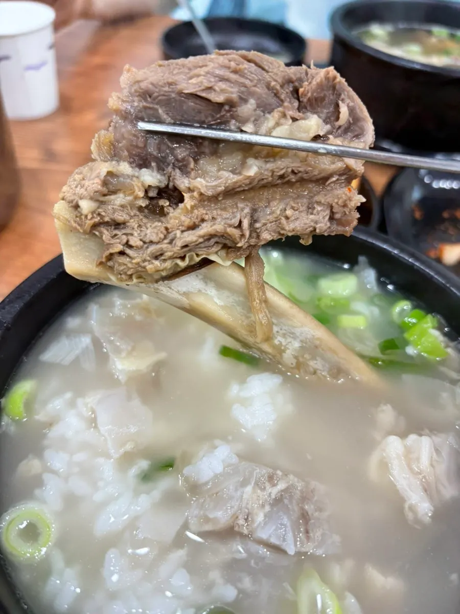 Tender rib meat sliding off the bone