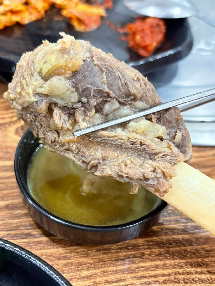Rib meat dipped in the house sauce