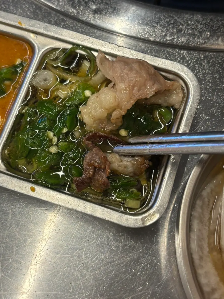 Cooked yeomtong and chadolbagi on the grill