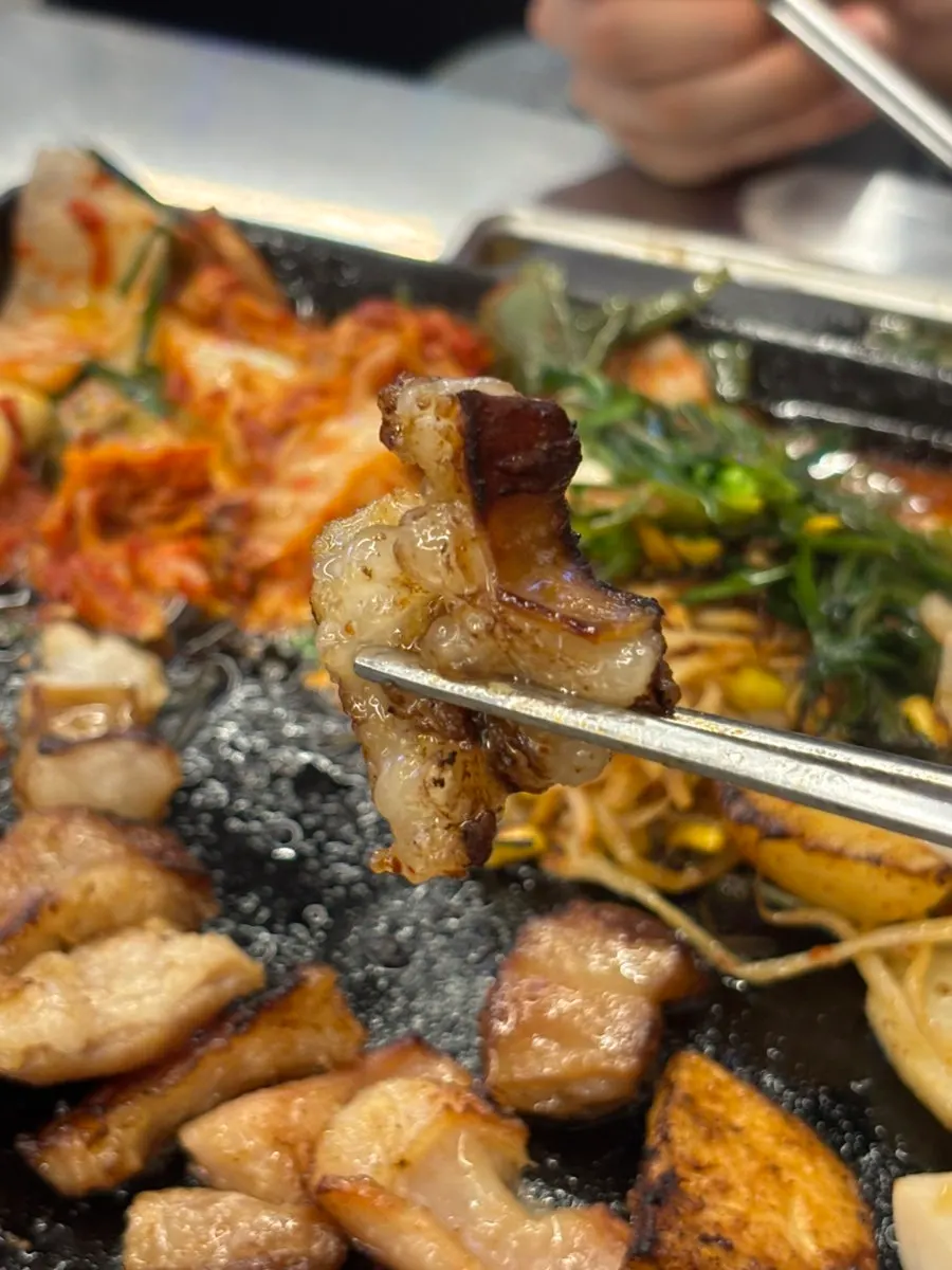 Gopchang dipped in cheongyang chili sauce
