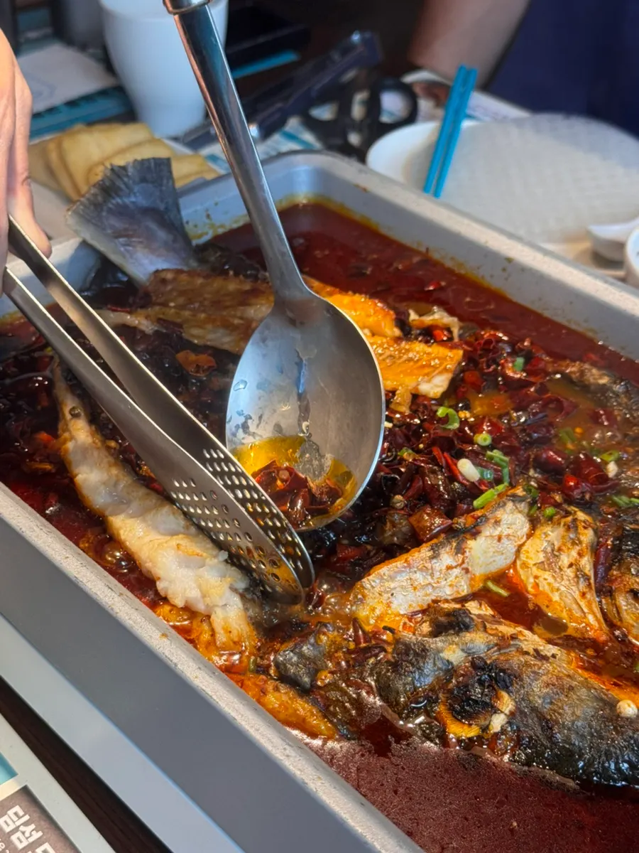 Mala broth piled high with red chilies