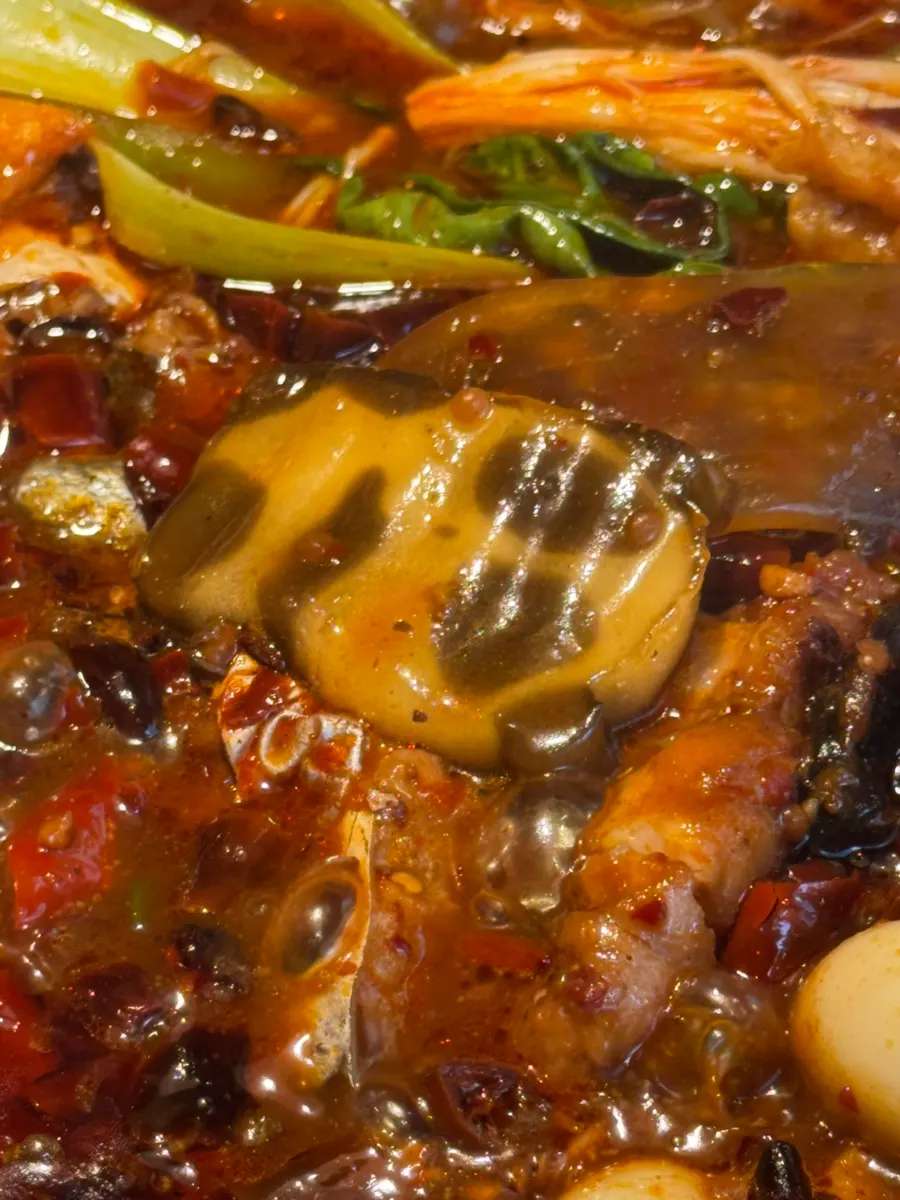 Fried tofu and tofu skin added into the broth