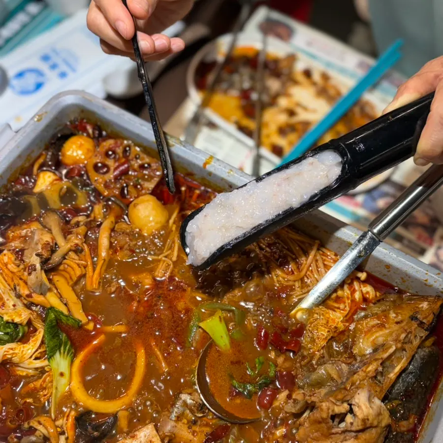 Pot of kaoyu toppings enjoyed hot pot-style
