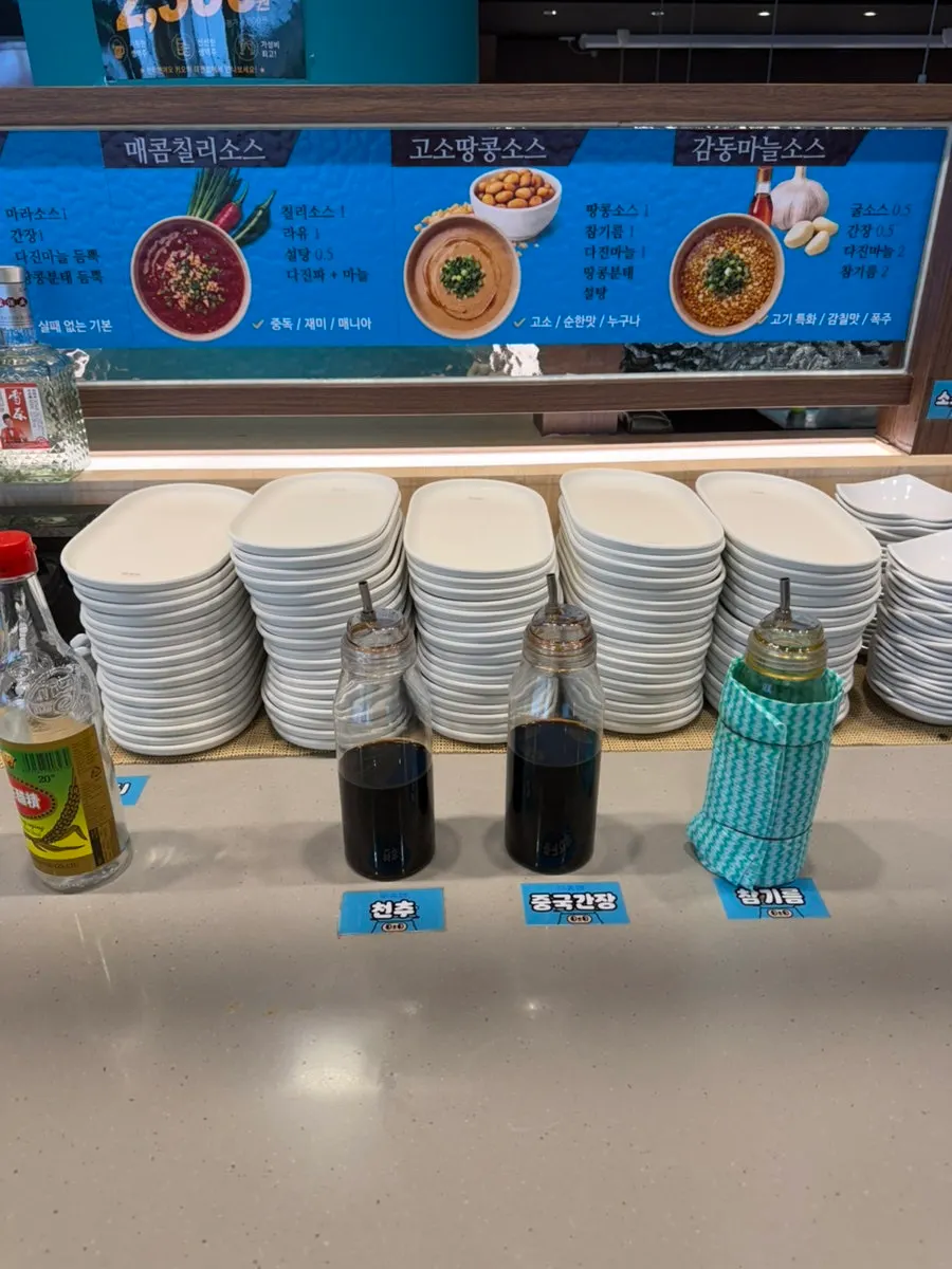 Mala sauce, peanut sauce, and other sauces on display