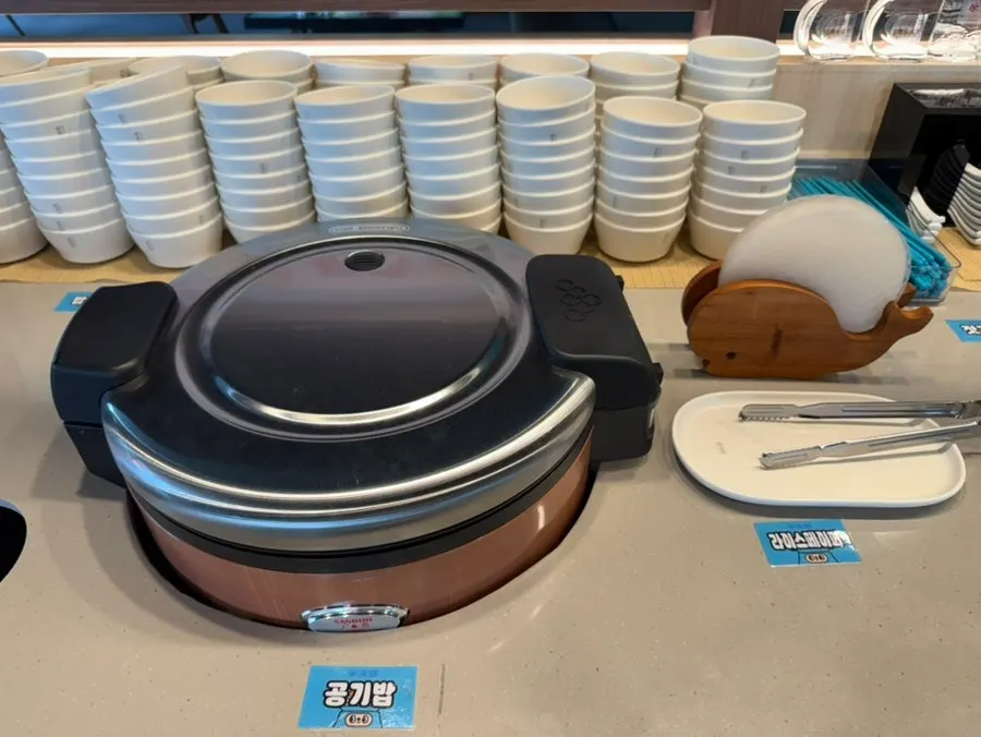 Self-bar corner with small plates and utensils arranged