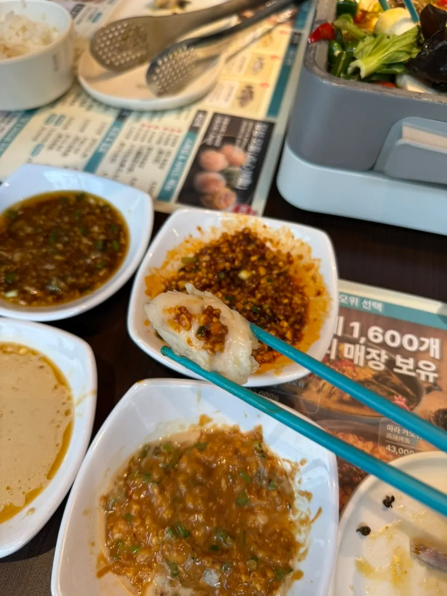 Plump fish meat visible in the qinghuajiao kaoyu